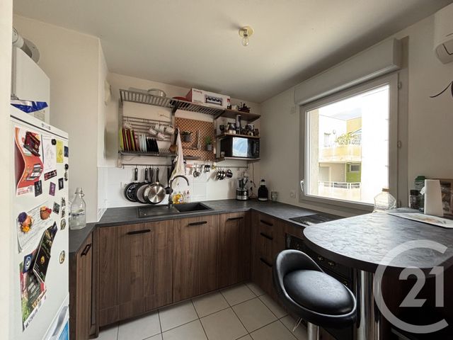 Appartement F2 à louer - 2 pièces - 41.48 m2 - MEYZIEU - 69 - RHONE-ALPES - Century 21 Le 7 De Coeur